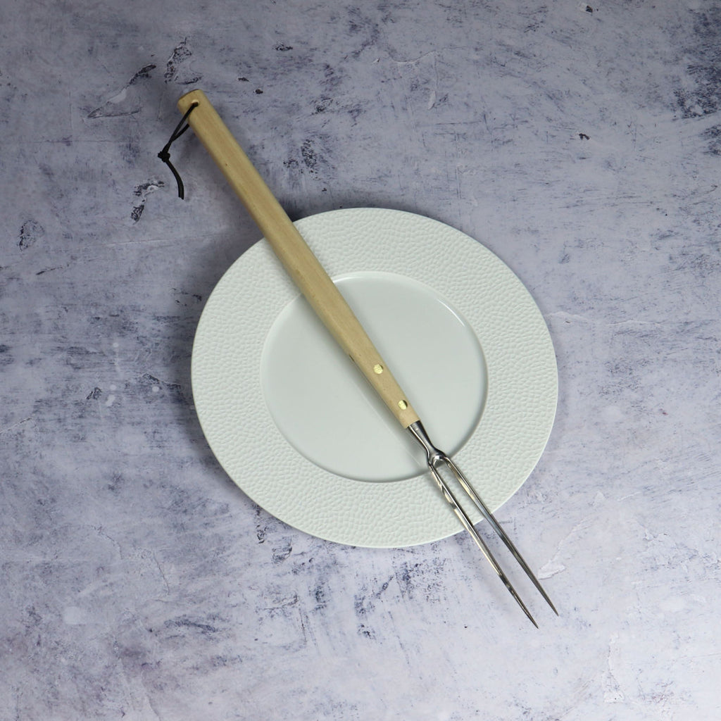 Fork chef wood handle on Degrenne Plate