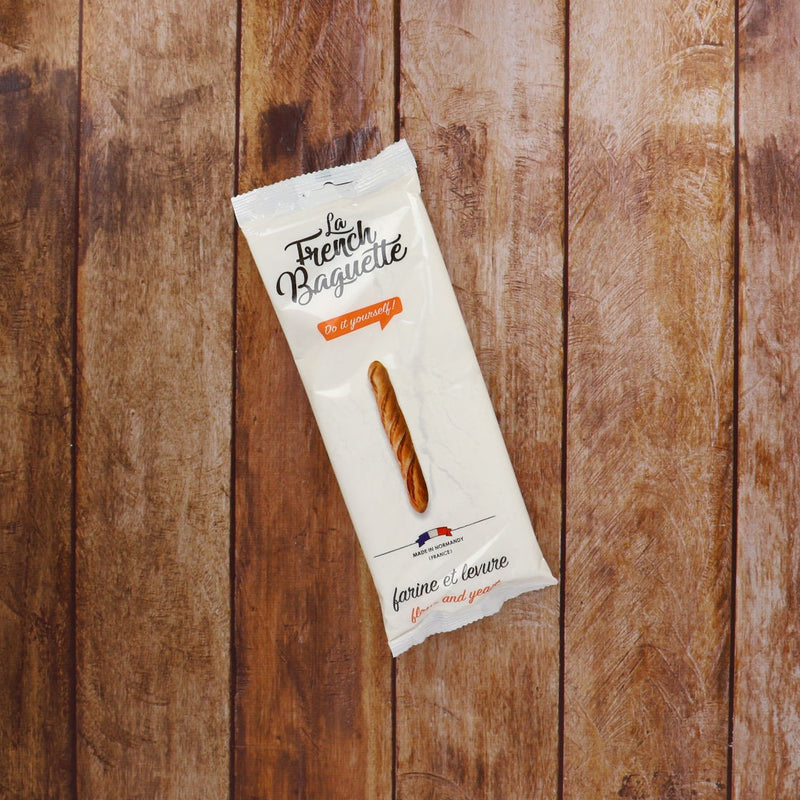 La French Baguette on Wood Table