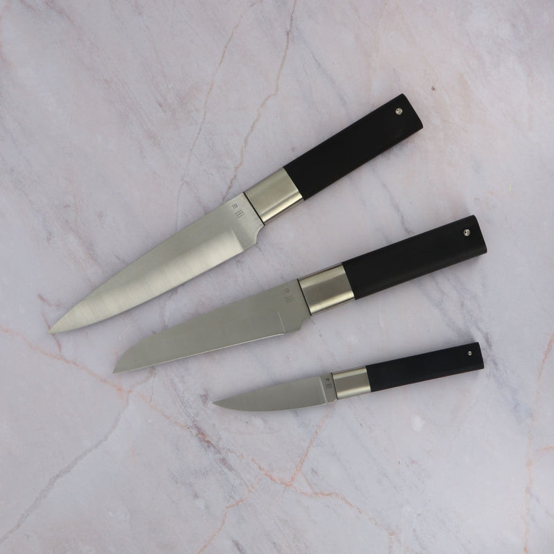 Knife set brown handle on marble table
