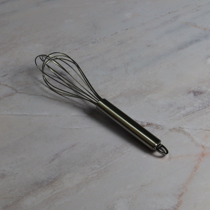 Classic Whisk on Marble Table