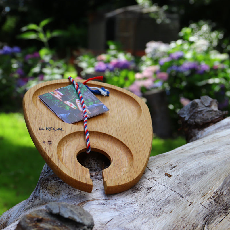 Cocktail Plate Glass Holder on Wood and Flowered Background