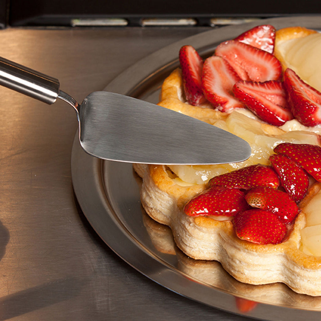 Cristel Cake server in front of a Strawberry Cake